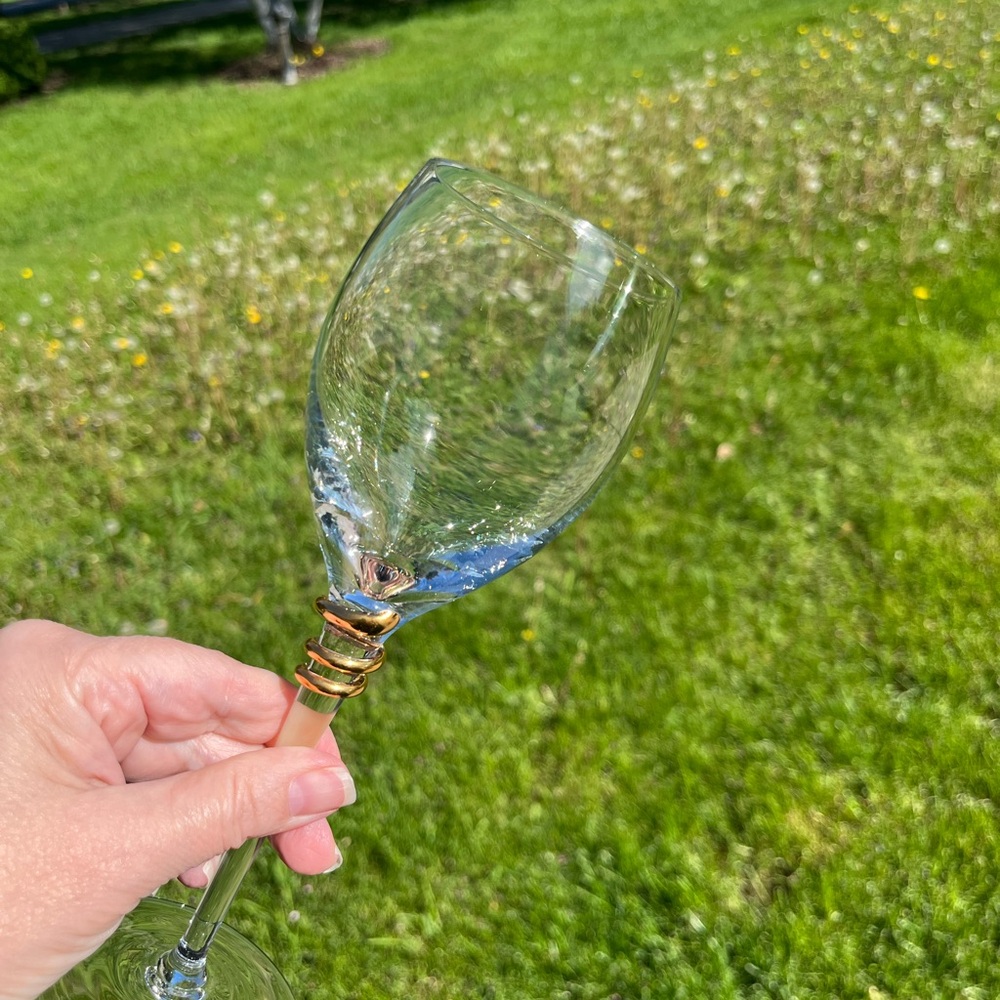 Elegant Crystal Wine Glass with a gold spiral stem. Gift for a special occasion.